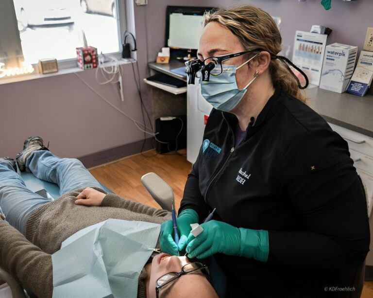 dental team member treating patient west coxsackie