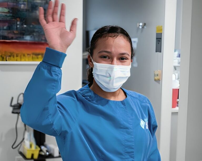 dental team member waving west coxsackie ny