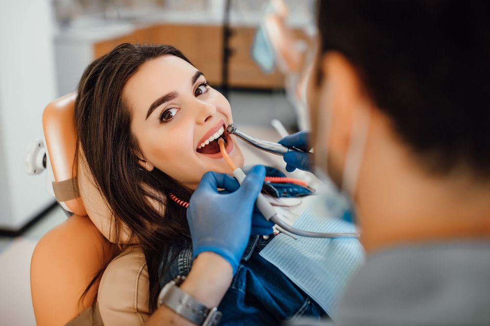 a women is getting dental treatment